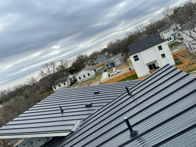 Standing seam metal roof panels with vents for Skylight Repair in Northport